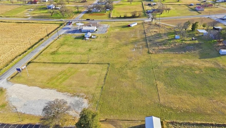 Prime 1.71-acre tract with approximately 139 feet of highway frontage on FM 2123 in Cottondale, TX. This cleared and level property sits in a highly visible location directly next to Cottondale Grocery and Shamrock fuel station, offering excellent exposure along a well-traveled corridor with an estimated 1,500+ vehicles per day. Located in unincorporated Wise County outside city limits, the property offers flexible potential for residential, commercial, or mixed-use development with no city zoning and no MUD or PID taxes. The tract measures approximately 139 ft of road frontage with a depth ranging from roughly 386–528 ft, providing ample space for a variety of uses including a contractor yard, equipment storage, small retail site, truck parking, shop, or investment property. Electric service available through Tri-County Electric Cooperative, rural water service nearby through West Wise SUD, and septic system would be required. Rare opportunity to secure highway frontage in the growing corridor between Azle and Paradise, just a short drive from the Fort Worth metro area. All info provided is deemed reliable but not guaranteed and should be independently verified buy buy and or buyers agent, including but not limited to property boundaries, acreage, utilities. development restrictions, zoning, and intended use. Survey is Available.