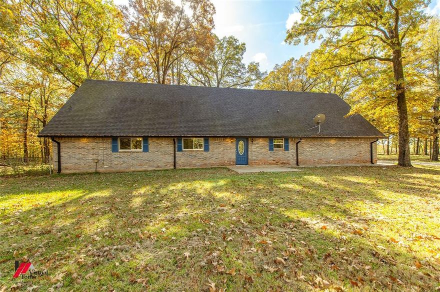 Get ready for REAL COUNTRY LIVING. Bring your ideas and huge family enjoy room to spread out on 4.5 acres in Haughton Louisiana. Located in the South Bossier Parish area and only 12 minutes away from Barksdale Air Force Base. This 5 Bedroom, 3 Bathroom brick home sits well back from the road with a long private extended driveway, abundant parking, and multiple garage options: a 2-car attached garage, an oversized 1-car garage with extra storage, plus a large workshop perfect for tools, equipment, or recreational vehicles.  Inside of this one-of-a-kind home you’ll find nearly 2,900 sq ft with generous bedroom sizes, Huge Master Bedroom oversized closets. Cozy main living area & fireplace with an upstairs with a versatile loft-style bonus second hang-out, media space, can function as a game room or living space for extended stay guest or family. The remodeled kitchen offers granite countertops, stainless steel appliances (including a Brand New over-the-range microwave), beautiful backsplash. Tons of storage in the higher end cabinets. The primary Master Bedroom and bath have also been refreshed; there is fresh interior paint in several areas. NO CARPET ANY WHERE!! Updated flooring gives you style and keeps you worry from allergies! Outside, the yard has been recently manicured so you can clearly see the usable open space around the home ideal for a garden, outdoor entertaining, or future projects. Additional peace-of-mind improvements include a newer septic line, 2 HVAC UNITS, Roof is less than 5 Years old. If you’ve been looking for acreage, storage, or ready to start a farm and be away from the city life?? You can continue to build, expand and create on this beautiful property.