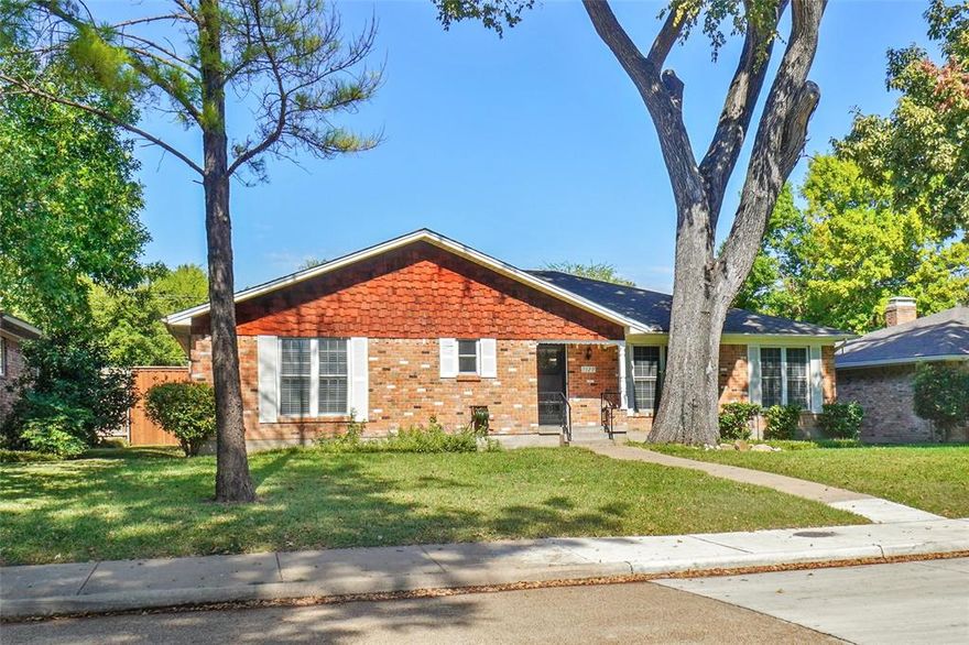 Charming Classic Brick Home in the Heart of East Dallas. This classic brick home has aged gracefully and offers a large, open floor plan in one of Dallas’ most desirable neighborhoods. Nestled on a tree-lined street in Mockingbird Meadows, this beautifully maintained, move-in-ready gem is zoned to Lakewood Elementary, one of the highest-ranked elementary schools in Dallas.  Step through the new front door and immediately notice the timeless charm of original hardwood flooring, new windows throughout, fresh interior paint, and updated light fixtures that create a warm and inviting atmosphere. The spacious living area flows seamlessly into a formal dining space, perfect for entertaining.  Featuring 3 bedrooms, 2.5 baths, and a 2-car garage, this home also offers an oversized laundry room with a utility sink and new kitchen appliances, including a refrigerator and the washer, and dryer.  The backyard is ideal for relaxing or hosting gatherings, complete with a covered patio and a new 8-foot board-on-board wood fence for privacy.  Enjoy convenient access to White Rock Lake, White Rock Trail, DART rail, Lakewood shopping, unique dining experiences in the area, and all the charm that East Dallas living has to offer. Moments from Lakewood Village and the Dallas Arboretum, this home offers a rare opportunity to create lasting memories at a wonderful price point.
