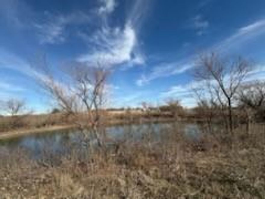 This listing offers a versatile 15.18-acre parcel in Godly, Texas. The pond makes it ideally suited for cattle operations, 
 building your new home, or exploring various development opportunities, making it a promising investment with endless possibilities. There are not any deed restrictions mobile homes welcome. Seller is willing to Sub divide. Please enter property on CR 1228, the land beside the acreage does not belong to seller.