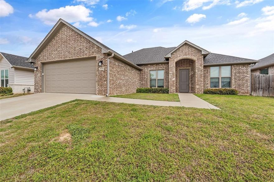 Come see this beautifully constructed 2021 home before it’s gone! Perfectly situated in one of Tyler’s most desirable subdivisions, this property offers both convenience and quality. You’re just seconds from Lindsey Park—one of the city’s premier outdoor destinations—and only minutes from the rapidly growing west side of Loop 323, featuring new restaurants, shopping, and entertainment. This all-brick, 4-bedroom, 2-bath home was built with no corners cut, showcasing granite countertops throughout and a thoughtfully designed layout. The split-bedroom floor plan provides privacy, while the spacious primary suite connects conveniently to a laundry room complete with countertops and ample storage. The inviting living room features a vaulted ceiling, creating an open and airy feel. The kitchen is ideal for both daily living and entertaining, with a large island that seats four, abundant counter space, extensive storage, and a gas cooktop. The dining area is bright and welcoming, enhanced by natural light from two large windows. Step outside to a fully fenced backyard with a covered patio—perfect for relaxing or hosting gatherings. With its unbeatable location, quality craftsmanship, and functional design, this home truly has it all. Don’t miss your chance to make it yours!