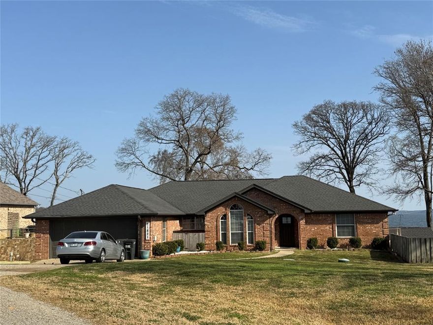 Beautiful lakefront home with panoramic views of Lake Palestine. This light and airy residence features majestic water views from the main living areas, highlighted by 10-foot ceilings and a dramatic wall of windows overlooking the lake. The home offers 3 bedrooms plus a dedicated office that can easily serve as a 4th bedroom. Enjoy outdoor living with a covered boat dock featuring two lifts and a spacious fishing area. Located at the end of a  private. This exclusive community does not allow rentals, and offers a private neighborhood that is peaceful, quiet, and a neighbor-friendly setting.

Large back yard, with firepit, that gently slopes to the lake. The home enjoys the highly desirable deep water of the lake. Additionally, the property shoreline is protected by a substantial concrete breakwater.