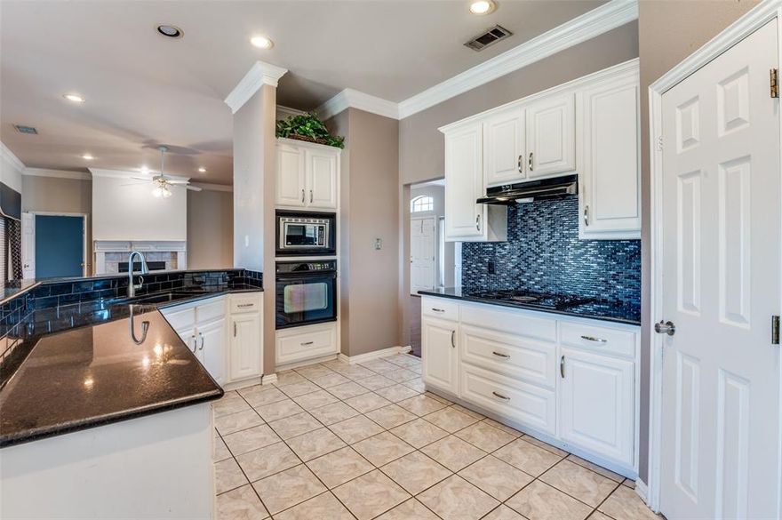 Come see this beautiful home that sits on an acre, perfect for entertaining inside or outside!  This home boasts beautiful flooring, decorative lighting and gorgeous tile backsplash and countertops in the kitchen.  Split bedroom floorplan with vaulted ceilings and crown molding.  Home has an open floorplan when you walk in with two spacious living areas, a formal dining room and a breakfast area in the kitchen.  The large backyard has a covered patio and added closet, perfect for storage.  Enjoy the feeling of country with easy access to HWY 175.