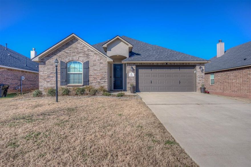 Located in Tuscany Crossing in Haughton, this well maintained 3 bedroom, 2 bath home offers 1910 square feet with an open floor plan and a 2 car garage. Features include ceramic wood look tile flooring in living areas, granite counter tops, and cherry oak colored cabinets throughout. The kitchen has a large island with sink that comfortably seats four and opens to the living area with a gas start wood burning fireplace. Spacious bedrooms, including a primary suite with double sinks, a large walk in closet, and a separate tub and shower. One secondary bedroom includes a unique built in nook behind the door. Enjoy a fenced in backyard and a prime location within walking distance to the middle school and just a mile from the high school. Close to Barksdale Airforce Base, shopping, entertainment, hospitals, and so much more. Come be a part of the Town of Haughton community. Possible VA Assumable loan. Schedule your showing today.