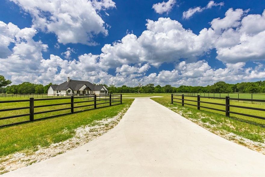 Check out this beautiful 408 acre secluded ranch 8 miles north of Sulphur Springs. Peaceful & quite with abundant wildlife, fishing, and some amazing views. A newly constructed contemporary style ranch house along with new fencing and cleared wooded areas make this a place to see. There are multiple ponds, seasonal creek, flowing spring, and a 9 acre lake stocked with bass, crappie, & catfish. Cross fenced for sectional grazing and working cattle pens. Currently has over 100 head of cattle grazing the fertilized bermuda grass pastures. There is a 2400' shop building with an attached 800' living area. Open 20 x 42 equipment shed and an 80 x 80 hay barn. The house has 10' ceilings, large windows with electric shades, luxury vinyl plank and tile flooring, spray foam insulation, and beautiful room decor.