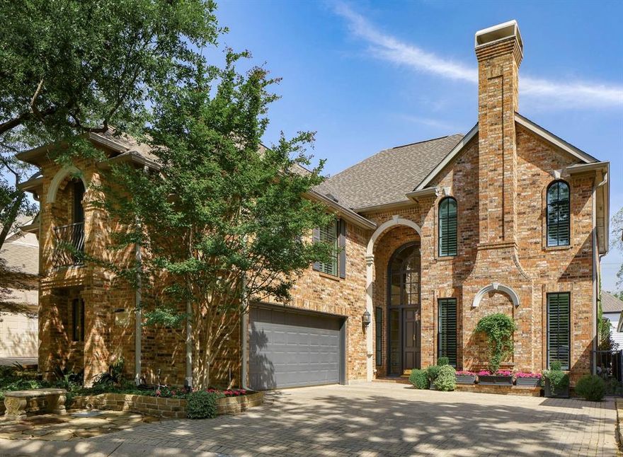 Beautifully situated in a private Preston Hollow gated community, this sophisticated residence was completely remodeled in 2022-2023 by the current owners, including new windows & a fully renovated kitchen & family room. The 4-bedrm, 4-bath home offers 4,292 sq ft of thoughtfully designed living space centered around a private landscaped courtyard, creating seamless indoor-outdoor living. The inviting floor plan features a formal living rm w gas FP & an elegant dining rm accented w designer wallpaper. A spacious family rm w fireplace opens to the completely updated gourmet kitchen, while a large game rm & dedicated fitness rm provide flexible spaces for recreation & wellness. The downstairs primary suite is a serene retreat, highlighted by a wall of windows overlooking the landscaped courtyard. The luxurious primary bath feat dual vanities, a soaking tub, separate shower &  oversized walk-in closet designed by California Closets. The kitchen was completely redesigned and renovated with new cabinetry, Dolomite countertops, built-in refrigerator & freezer, Thermador ovens & gas cooktop, dual dishwashers, a farmhouse sink, Sub-Zero wine refrigerator, beverage drawers & an oversized walk-in pantry. A large eat-in seating area makes the kitchen the heart of the home. The adjacent family rm feat custom built-in cabinetry, a gas FP w stone surround & direct access to the courtyard. A secondary ensuite bedrm on the 1st floor—currently used as a study—includes built-ins & a walk-in closet, providing flexible living options. Upstairs are 2 oversized ensuite bedrms w walk-in closets, along w a spacious game rm featuring custom built-in cabinetry, desk area, Juliette balcony, & abundant storage. A dedicated fitness rm w skylight & wall mirror offers additional versatility & could easily serve as a secondary bedrm or bunk room. Additional highlights include hardwd floors throughout, new windows installed in 2022, 2 Navien tankless water heaters, & a 2-car garage w built-ins.