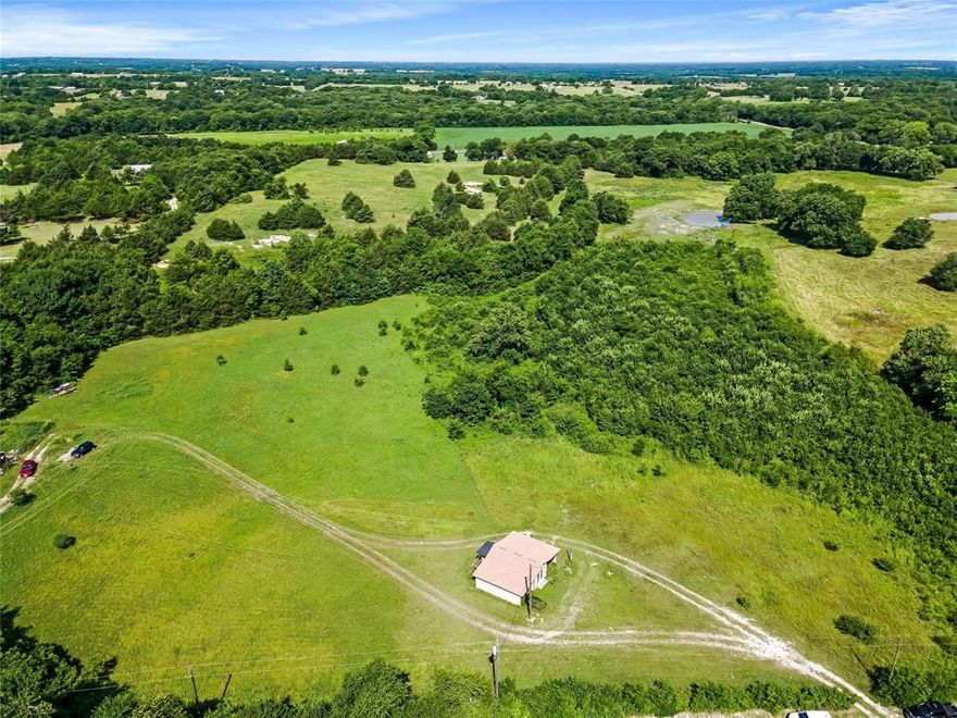 Welcome to this picturesque 9-acre property nestled in the heart of breathtaking countryside!  This is a gem of natural beauty and presents an incredible opportunity for those seeking a tranquil retreat or a versatile agricultural venture.  This property is prime for development, making it a truly exceptional find. Don't miss this incredible opportunity to own 9 acres of rolling hills. Currently no utilites are on this tract but water and electricity are close by and it offers the potential for an agricultural exemption. With its natural beauty and entrance set back off the main road, you can make this your own retreat away from the hustle and bustle.  The shed near the entrance will convey.  The 9 acres are being sold from an 11 acre tract  Sellers are retaining the remaining 2 acres.  A new survey will need to be done as well as a separate water and electric meter.  Showings are scheduled through BrokerBay - do not access property without licensed Representation and showing service appt.  Boundary lines are approximate.  New survey will determine actual acreage boundaries - See photo of approx acreage being sold and previous survey in Transaction desk. Street address of 510 is for the remaining 2 acres.