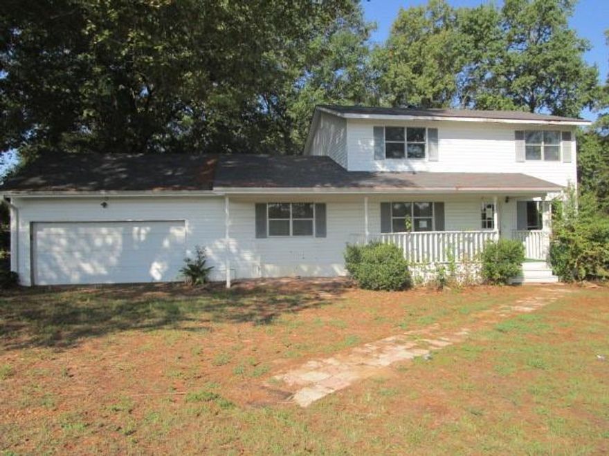 Large home with 4 bedrooms and 3 full baths. Large living room. 3 bedrooms upstairs and 1 down. Large .75 acre lot. 2 car garage. AGENTS: see agent remarks on submitting offers. All info is estimated and needs to be verified by buyer and buyers agent before submitting any offer.