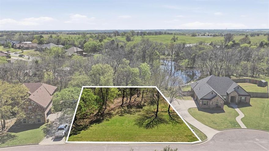 Location! Rare vacant lot in established neighborhood in the heart of Pottsboro. Walking distance to Cardinal Stadium, Friendship Park, and PISD Elementary and Middle Schools and more. Quick drive to Lake Texoma. Build your dream home that backs up to wooded privacy. Check it out today!
