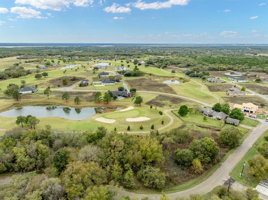 Stunning lot with incredible views on the #6 Green of the New Course in White Bluff. Peace & tranquility awaits you in a 24-7 gated resort community located on a top notch lake in Central Texas, Lake Whitney. Here lies a great community atmosphere with a laid back lifestyle. You will never need to leave home as White Bluff has it all! Pools, golf, marina, restaurant, waterfront pub, store, gym, salon, church, tennis, playground, catch and release ponds, nature watching, and so much more! Get on your golf cart and enjoy the thousands of acres to explore with Lake Whitney water access! Come and build your dream home, weekend get-away, or even buy and hold the lot to enjoy amenities for years to come!