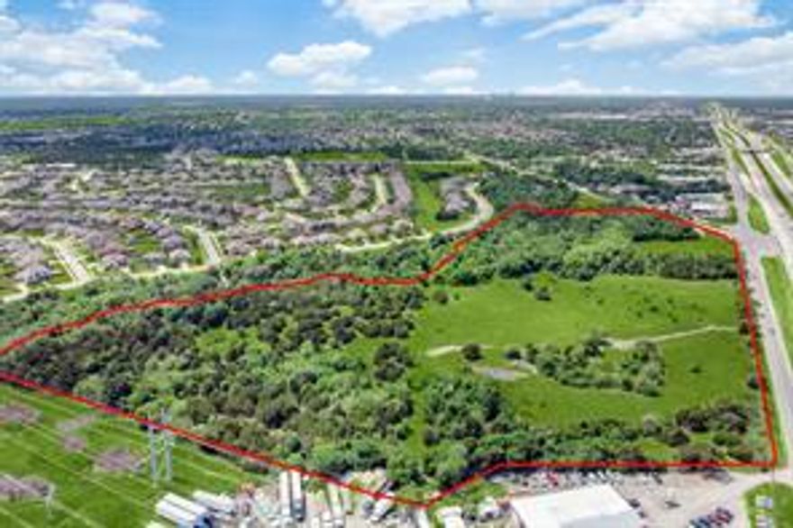 One of the best remaining tracts in Cedar Hill for development. 28 Acres at the corner of Joe Wilson Rd and J Elmer Weaver Fwy (US 67) in Cedar Hill, Texas.  Corner is zoned local retail (approximately 15 acres) and 13 acres of the property along the creeks is zoned SF-10 (single family, minimum lot size 10,000 square feet).  The SF-10 area backs up to a creek and jogging trail.