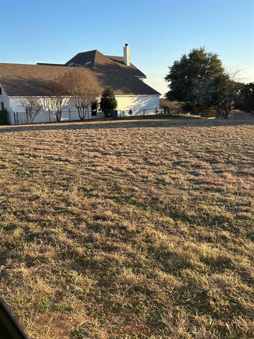 Build your custom home on this desirable lot in Cleburne, TX! Located at 7233 Carnoustie Drive, this residential lot offers a peaceful neighborhood setting with utilities available and a semi-annual POA of $600. Site-built homes only—mobile homes are not allowed, and a minimum square footage requirement applies, helping maintain neighborhood quality and value. No time limit to build, allowing flexibility for future plans. Convenient access to schools, shopping, dining, and major highways, with an easy commute to Fort Worth and the DFW metroplex. A great opportunity for homeowners or builders in a growing community.