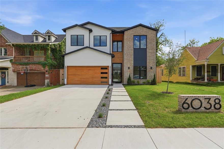 In the heart of one of Dallas most sought-after neighborhoods, just steps from Lower Greenville and minutes from Lakewood, this stunning residence blends modern design with everyday comfort. Offering 5 spacious bedrooms and 5 full bathrooms, the home features soaring ceilings, a striking fireplace, and expansive windows that fill the space with natural light. The open concept layout flows seamlessly from the main living area to the outdoor retreat through oversized patio doors perfect for indoor-outdoor living and entertaining. The chef’s kitchen is a true centerpiece, complete with a large island, high end appliances, and plenty of space for gathering with family and guests. The primary suite offers a private escape, featuring a spa-inspired bathroom with dual walk in showers, elegant finishes, and a generous walk in closet. A first-floor office with an ensuite bath provides flexibility as a workspace, guest suite, or multigenerational living option. Upstairs, you’ll find three additional bedrooms, each with its own ensuite bathroom and walk-in closet, along with a spacious game room and a fully equipped media room ideal for entertainment and relaxation. This thoughtfully designed home offers a rare opportunity to own a truly exceptional property in a prime Dallas location.