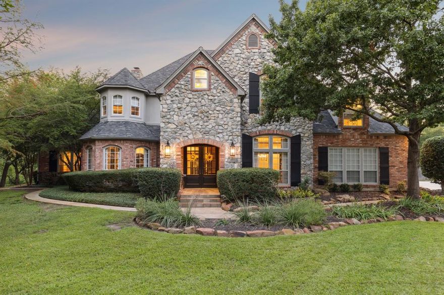 This fabulous transitional home is set on a rare and remarkable 3.5-acre lot along the prestigious White Chapel Blvd, offering peaceful countryside living. Conveniently located between Dallas and Fort Worth it provides easy access to DFW International Airport, and the entire DFW metroplex. Plus, there’s no HOA! Ideal for active families, this 5-bedroom, 4.1-bathroom home exudes casual elegance throughout. The gourmet kitchen features custom cabinetry, stunning Quartzite countertops, a large island, double ovens, an electric cooktop, and a stainless steel refrigerator— superb for any chef. The luxurious primary suite is a true retreat with a cozy fireplace, private library, and office, all overlooking the beautiful pool, spa, and wooded backyard. With four additional spacious bedrooms, this home offers plenty of room for family and guests. The game room, living room, and family room are perfect for gathering and entertaining. Step outside into the outstanding backyard—your personal oasis. Enjoy ultimate privacy and serenity as you gather around the fire pit, zipline through the trees, or practice your swing on the putting green. The garage is fully equipped with built-in cabinetry and epoxy flooring, adding even more functionality to this remarkable property. Buyer to verify all measurements, taxes, schools, and other information. Don’t miss your chance to call this extraordinary property home!