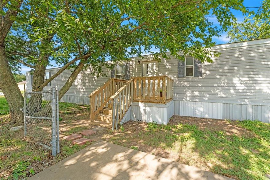 Great starter home, student residence or investment. Located on a corner lot with manageable size, appealing for the first -time homeowner or full-time college student. Only minutes away from Tarleton University and grade schools. Small and efficient 2-bedroom, 2-bath home fenced front yard with big shad tree. Open concept kitchen living area making plenty of room for entertaining.  Utility closet for washer and dryer. Don't blink... this one will be gone!!! Seller will offer $5,000 in down payment assistance.