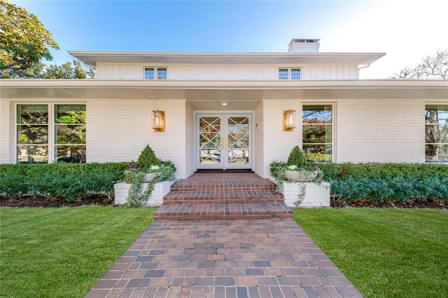 Stunning timeless design with modern updates in highly desirable Russwood Acres. Situated on .508 acre lot, the home is thoughtfully designed to offer seamless indoor-outdoor living, integrated smart technology, and refined finishes-crafted for both everyday family life and exceptional entertaining. The main floor features a luxurious primary suite with spa-inspired bath and two incredible custom closets with a center island and built in vanity. The soaring great room has an incredible fireplace with built-ins and perfectly placed wet bar, an elegant foyer-art gallery and a chef’s kitchen with an expansive island. The kitchen is equipped with premium Kitchen Aid refrigerator, gas range, double ovens & beverage cooler. Adjacent dining areas include a charming breakfast nook with banquette seating and a formal dining room. Additional highlights include a private guest ensuite and third ensuite perfect for an office,hallway gift-wrapping station and a utility space featuring a pet friendly dog wash station. Upstairs, discover two additional bedrooms, one with a living area. Well appointed with designer finishes, incredible sconces, and lighting, wallpaper accents, imported tile and thoughtful floor plan. Energy – efficient features tankless water, and new roof and foam insulation. Pre-wired for surround sound & security systems.Nestled beneath century-old trees adorned with professional stage lighting, this breathtaking backyard transforms into a private oasis. The redesigned pool features elegant new surround tile, coping and a luxurious Pebble-finish surface, perfectly complemented by a lush turf yard. Whether you’re hosting a grand celebration or an intimate evening, this space offers the ideal setting for unforgettable gatherings.There is a three car garage with ample storage and additional side yard perfect for urban gardening, dog play area or sports court.This estate offers a rare blend of privacy, elegance, and comfort.