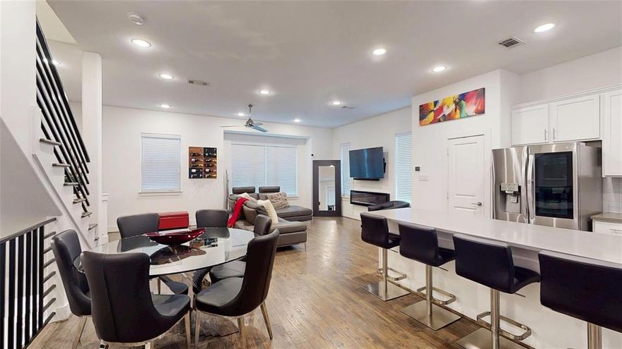 Modern 3-story corner unit condo! Terrific location just two blocks from Greenville and Henderson Ave with endless options for dining, entertainment, and shopping, PLUS only a short distance to downtown! Inside you will find 2 bedrooms, 2.5 baths and a 2-car garage with ample storage space! First floor living space makes an ideal home office. Main living on the second level offers an open concept layout perfect for entertaining. A spacious kitchen boasts quartz countertops with a glass subway tile backsplash, an abundance of bright white cabinetry, stainless appliances including an electric range, and large island with breakfast bar. Two bedrooms are located on the third floor, both with private ensuite baths and walk-in closets. Laundry is conveniently located on this level as well. The primary retreat with sitting area offers a luxurious bath with a dual sink vanity and frameless shower. Rich hardwood flooring flows throughout main living areas of the home with plush carpeting in both bedrooms!