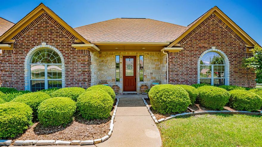 Welcome to Bentwater on Lake Granbury.  This immaculate three-bedroom, three car garage on over an acre with a game room and a pool has so much to offer. This home shows pride in ownership through!  Luxury vinyl plank floors downstairs and practically unlived on carpet upstairs make it move in ready.  Sparkling diving pool with a large, covered patio for outdoor gatherings make it the place to be for the summer.  Bentwater has neighborhood ponds for fishing, a sports court area as well as a neighborhood marina.  This home comes with a deed boat slip H24 making lake usage affordable without having to be on the water.
