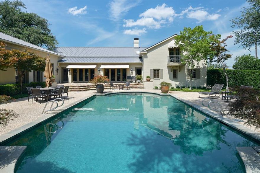 Rebuilt from the foundation in 1994 & added on in 2004, this Santa Barbara ranch style estate home provides multiple entertaining spaces, with most rooms offering floor to ceiling windows and doors to the gorgeous back yard and pool area. Downstairs includes open floor plan with living & dining, 2 great rooms with vaulted ceilings, 2 wet bars, open kitchen & living, a beautiful 30' primary suite with living area and fireplace and dual baths and closets, plus full guest suite with bedroom and living area (currently used as exercise and library). Upstairs includes two bedroom suites. Safe room, work room in the 3 car garage, full house generator, dog shower, and more! Roof and hvac replaced in the last 2 years.