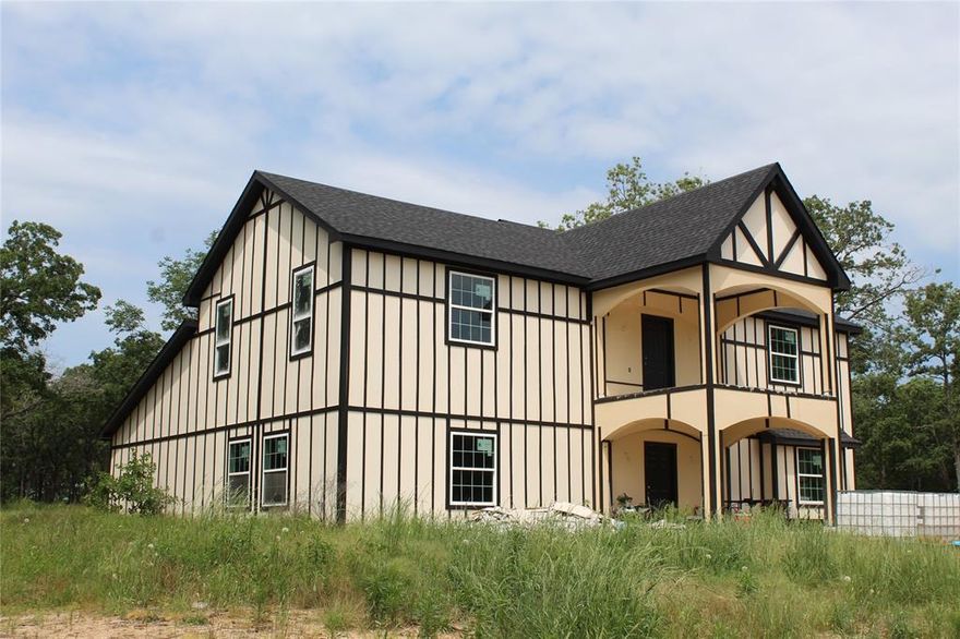 DIAMOND IN THE ROUGH.  Situated on approximately 5.64 acres, this home is the epitome of privacy and is truly a blank canvass.  The home boasts approximately 3803 square feet and is completely dried in.  Drywall, doors, and windows are all installed as well as tile flooring throughout the lower level.  If you are looking for a country get-away, come see this remarkable home and make it yours.