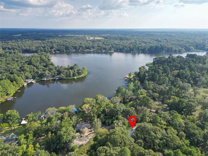 Welcome to 998 County Road 3230 in Quitman, a charming three bedroom two bathroom home in the sought after Lake Lydia community. This property offers a beautiful water view and a serene setting with mature trees and a quiet neighborhood feel. Inside you will find an open floor plan that blends the living, dining and kitchen areas, creating a spacious and inviting environment for everyday living or entertaining. A large front patio provides the perfect spot to relax and enjoy the peaceful surroundings and scenic lake views. With its inviting layout and proximity to Lake Lydia amenities, this home is an ideal retreat or full time residence.