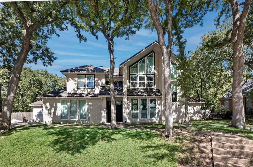 Tucked away on a quiet, tree-lined cul-de-sac, this home offers rare privacy, comfort, and thoughtful updates. From the moment you walk in, you’re greeted by a wall of windows overlooking the sparkling pool and a lush wooded greenbelt with serene, mature trees. The first floor is designed for everyday living and entertaining, featuring two spacious living areas that open to the kitchen and outdoor spaces, a dedicated home office with private entrance, and two convenient half baths for guests. The primary suite enjoys peaceful backyard views, private patio access, a soaking tub, and dual closets, offering a true retreat within the home. Upstairs, four additional bedrooms include a flexible space that can serve as a media room, playroom, or second office to fit your needs. Extensive updates completed in 2021 include all-new windows, a fully renovated kitchen with new appliances, refreshed attic insulation, and updated pool equipment—providing peace of mind and energy efficiency for years to come. Whether you’re lounging poolside in your secluded backyard oasis, working from home in comfort, or hosting friends and family, this home blends function, beauty, and unmatched privacy in all the right ways.