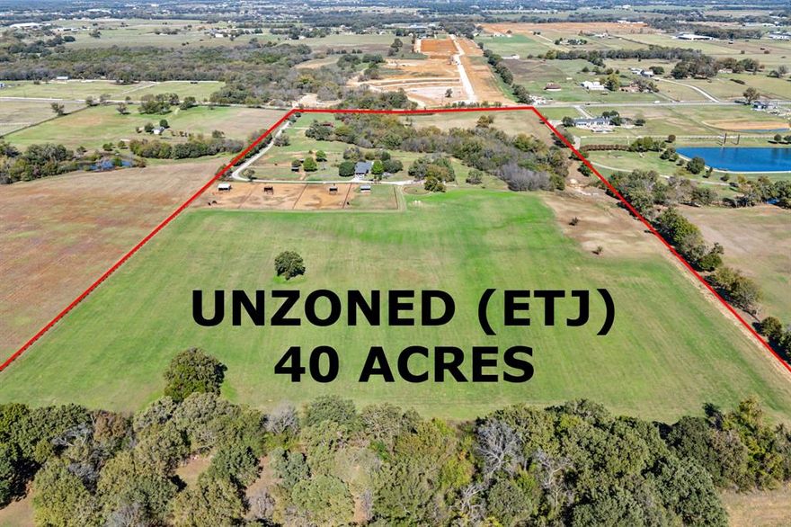 Forty acres of breathtaking land featuring a vast array of development options. This rare opportunity offering is unzoned and in the ETJ offering a wide array of development possibilities in addition to being agriculturally exempt. As development is exploding in Aubrey, this property is very well positioned for the growth being directly on a major arterial road and with quick access to Highway 377 and the proposed upcoming Outer Loop which will connect I-35 to the Dallas North Tollway. New nearby grocery stores and other large retail projects are in the works as well to add to your shopping convenience. This property is a canvas, painted not just with flat, traditional features, but enhanced by the majestic allure of towering, mature trees. The undulating topography offers spots for breathtaking vistas and hidden retreats, where one can lose themselves in the serenade of rustling leaves and chirping songbirds. Meandering gracefully through this captivating landscape, a lovely creek adds a touch of serenity, inviting you to sit back, relax, and savor the gentle flow of life. Whether envisioned as a luxurious private estate or an innovative development brimming with potential, this property transcends the ordinary, delivering an inspiring atmosphere for exploration and creation.