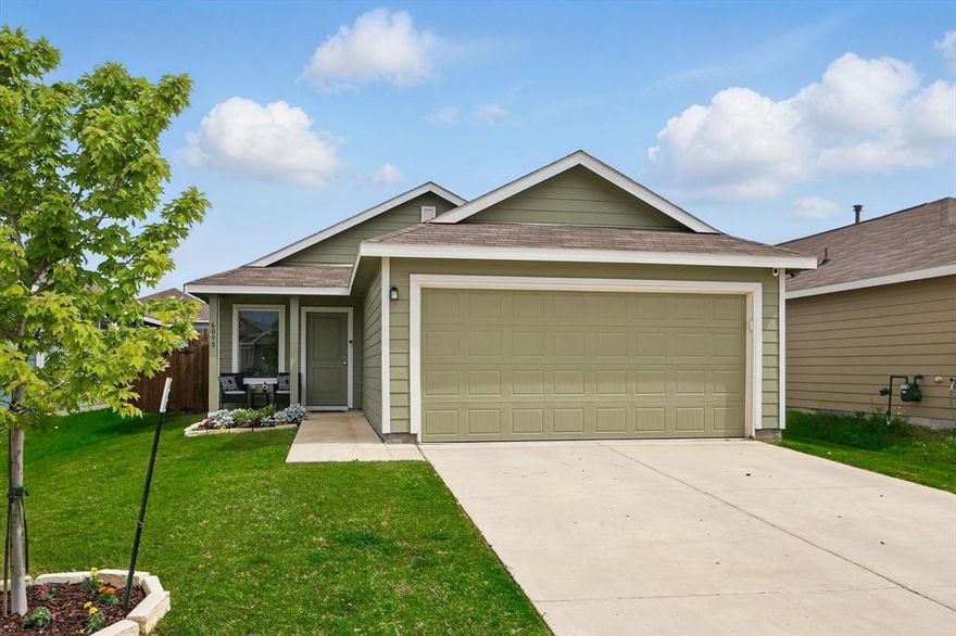 This charming and upgraded almost new home is so inviting! The front porch welcomes you home. Enter this open concept floor plan with new ceiling fan, chandelier, and accent wall. Kitchen features gas range, abundant counter space, and new cabinet pulls. Many special touches include new door knobs, built in frame on TV in family room which will remain. The primary bedroom is a gem with wood accent wall and spacious walk-in closet. The owners have spared no details in this home! This home comes with an assumable loan at an incredible 4.25% interest rate with qualified buyer - this could mean significant savings! Come and see this lovely home today.