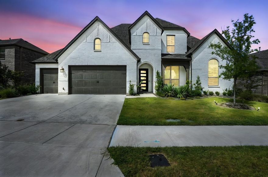 Stunning 5-bedroom, 5.5-bath Highland Homes residence offering 3,998 sq ft of luxury living in the highly sought-after Wildridge community! Situated on an oversized lot, this exceptional home features a rare 3-car tandem garage plus a 4th car bay—perfect for additional storage or hobby space.

Step inside to discover an open-concept floor plan with a spacious chef’s kitchen overlooking the expansive family and dining areas—ideal for entertaining. The first floor boasts a private guest suite, dedicated study, media or entertainment room, and a luxurious primary retreat. The primary bathroom impresses with an oversized walk-in shower featuring a rain head and a freestanding soaking tub for a true spa-like experience.

Enjoy seamless indoor-outdoor living with sliding glass doors that open to a covered patio spanning the entire width of the home, leading to a large, private backyard—perfect for gatherings or relaxation.

Upstairs, you’ll find three generously sized bedrooms, each with its own ensuite bath, including one with a private sitting area—ideal for multigenerational living or guest comfort.

The home’s striking exterior showcases a crisp white finish with modern dark accents, offering timeless curb appeal.

Located in the award-winning Wildridge Community, residents enjoy resort-style amenities including a pool, scenic hike and bike trails, fishing ponds, parks, playgrounds, lake access, and a full-time Lifestyle Director hosting community events year-round. Nestled along the serene peninsula of Lake Lewisville, this home offers the perfect blend of nature, luxury, and convenience.