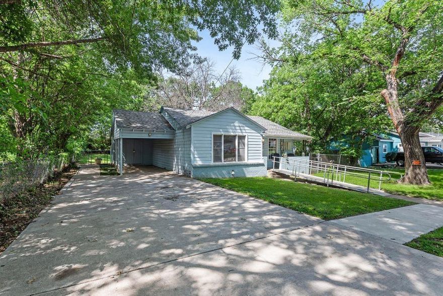 Tucked beneath mature shade trees, this charming home offers character, flexibility, and solid bones. With over 1,100 square feet, the layout currently features 2 bedrooms and 1 full bath, with the potential to easily convert back to a 3-bedroom configuration if desired.

Inside, you’ll find unique built-in features, warm cedar trim accents, and a comfortable feel that’s hard to replicate in newer homes. The home is dated, but well-maintained and in good condition, making it a great opportunity for buyers who appreciate vintage charm or want to add their own modern touches over time.

The large trees provide shade and curb appeal, while the interior offers warmth and personality. Appliances are not included. Whether you’re looking for a starter home, downsizing, investment property, or a place to make your own, this one has potential written all over it.