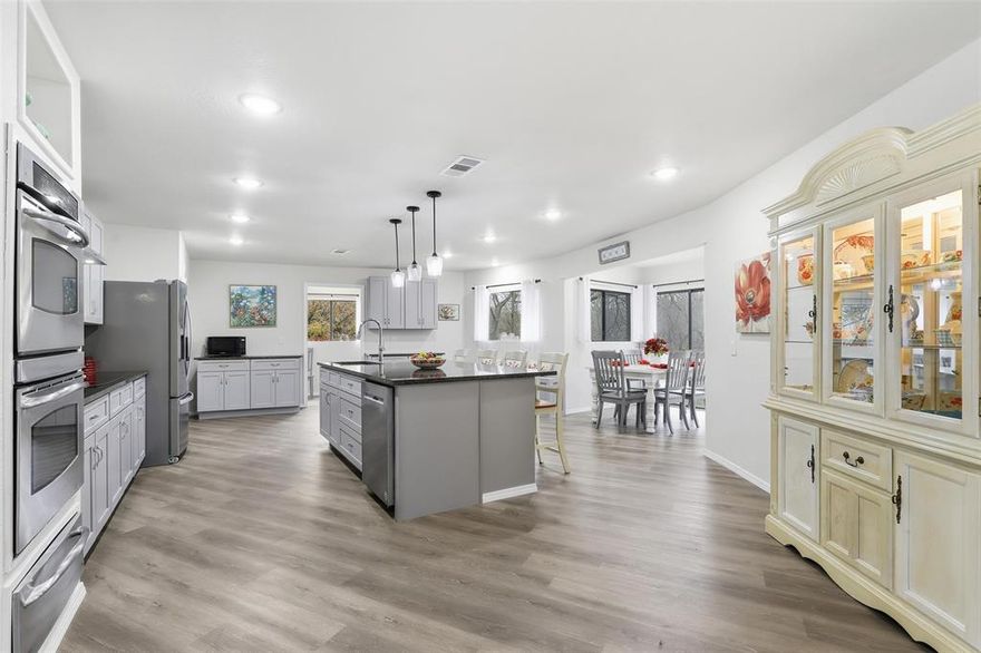 Exceptional Opportunity: Turnkey Remodeled Dual-Home Retreat on 3 Acres
Discover a rare and versatile property featuring two completely remodeled single-story homes with a sparkling pool perfectly situated between them. Sold fully furnished, this turnkey retreat includes everything needed for immediate enjoyment or income production—right down to all dishes, cookware, linens, a pinball machine, and an air hockey table.

Designed to comfortably sleep up to 12 guests (including sofa sleepers), the layout is ideal for short-term rentals, corporate or business retreat use, or multigenerational living. Each home offers modern finishes, thoughtful updates, and seamless indoor-outdoor living, creating both privacy and connection.

Set on 3.14 peaceful acres within a rural subdivision, the property offers space, tranquility, and flexibility rarely found. A fully paid-off bank of 98 solar panels provides exceptional energy efficiency—electric costs are typically limited to the basic service fee.  Included is still most of an acre available for a shop or whatever the buyer wants.

Whether you’re seeking a profitable investment, a private family compound, or a unique gathering place for business or recreation, this property delivers unmatched value, comfort, and opportunity—all ready from day one.