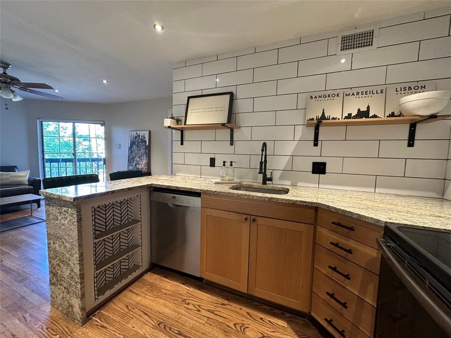 MUST SEE!!! This very well updated Condo with a wonderful view.  It is fully furnished, including; recessed lighting throughout, Bosch Dishwasher, Ring Doorbell camera, an LG  single unit, ventless Washer Dryer, Granite Countertops.  So much thought was put into the updates to maximize the usability of the space.  It feels much larger than 448 sq ft.  This is a very quiet condo complex in a prime location.  Plenty of shopping, restaurants and very close to PGBT as well as DNT.  The TV and linens are just for staging.  Everything else that is there is part of the furnishing.