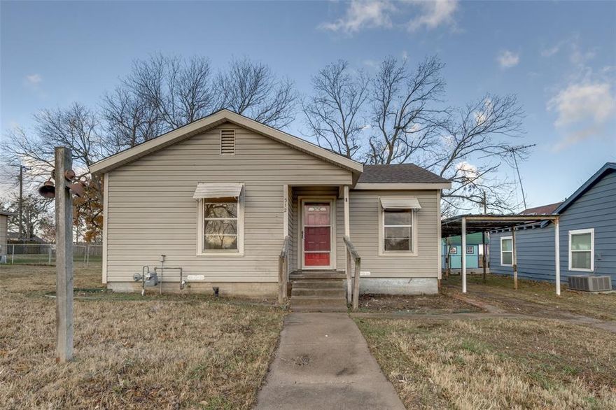 Charming and full of potential, this two-bedroom, two-bath home is ideally located just east of Highway 75 in Howe, Texas, right off the highway and perfectly positioned midway between McKinney and Denison. Situated in the older downtown area, the property offers small-town character with convenient access to major commuting routes, shopping, and dining.

The home sits on a pleasant subdivision lot with mature trees that provide shade and curb appeal. A detached storage building adds valuable space for tools, equipment, or hobbies, while the one-car carport offers covered parking and easy access to the home.

Inside, the house reflects its original charm while featuring numerous updates completed over time. The exterior is finished with siding, and the home is supported by a pier-and-beam foundation, allowing for easier maintenance and future improvements. Gas service is available, with gas appliances already in place—an appealing feature for buyers who prefer efficiency and performance.

With two bedrooms and two full bathrooms, the layout is functional and comfortable, making it well-suited for first-time buyers, downsizers, or investors. While the home does need some additional work, it presents an excellent opportunity to add personal touches and build equity. The fixer-upper nature of the property allows buyers to customize finishes and upgrades to their taste while preserving the character of an older home.

This property offers a rare combination of location, charm, and potential in the heart of Howe. Whether you’re looking for a 
starter home, an investment opportunity, or a renovation project with upside, this home delivers solid value and endless possibilities in a growing North Texas community.