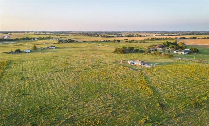 If you’ve been searching for the ideal homesite to build your custom home, this three-acre lot offers an exceptional opportunity. Located in Phase two of the desirable Elm Branch Subdivision, this property provides generous space, privacy, and a well-planned setting designed to protect long-term value. A water meter is approved for the lot, with the option to have it installed prior to closing for a minimal additional fee. County approval is almost on file, allowing for a smooth and efficient closing timeline. This is a build-site-only lot with deed restrictions in place to maintain the quality and consistency of the subdivision; mobile homes are not permitted. Situated in the highly sought-after West ISD, this property combines an excellent location with flexibility and convenience. The developer is open to offering a bundled option for new construction, or buyers may choose their own builder to create a home tailored to their vision. This is a rare chance to secure a spacious, build-ready lot in a well-established subdivision.