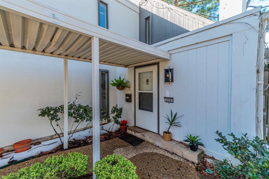 Nestled in the desirable Southridge neighborhood, this classic condo is ready for your personal touch. Lovely large open living-dining-sunroom area with beamed cathedral ceiling, dramatic wrought iron spiral staircase, and fireplace will greet you or your guests. Situated on the end of the building, this unit has its own fenced courtyard with private gate to the community pool. Other downstairs features include the cozy kitchen (fridge remains) with recent appliances; a guest room with built-in desk; a full bathroom with walk-in shower; and the utility closet (washer & dryer remain). Upstairs you will discover a spacious primary bedroom with additional sitting area; a sit-down vanity and walk-in closet; full bath with tub & shower combination; and a secondary bedroom, ideal for office, workout room, or nursery. Recent updates include roof, sewer line, HVAC system, water heater, and carpet. Abundant storage throughout. Each unit has an assigned covered parking space and storage unit. HOA fees include water, sewer, solid waste, sprinkler system, exterior lighting, landscaping including trees & bushes, and major exterior maintenance when needed. The owner of this unit will own 15.6% of entire property. -- So close to shopping, universities, and easy access to I-35! Make it yours today!