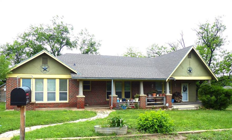 Very nice three bed three bath brick home on corner lot.  1932 sq ft of living space under central heat and air.  This home features hardwood floors, a woodburning fireplace, and a spacious bonus room. The bedrooms are all large.  The kitchen is equipped with a farm sink, stainless steel appliances, and custom King cabinets.  The dining room offers built in features.  The living room is more than spacious and includes a woodburning fireplace. There is a nice storage building as well as a workshop on the property.  This home also includes a sprinkler system.  This is all included on a corner lot with lots of room.