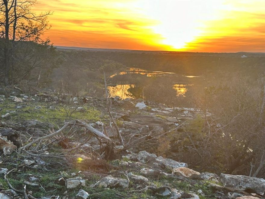 Great build sites overlooking Rock Creek, which joins beautiful Possum Kingdom Lake. This 90+ acre ranch has 100 ft limestone bluffs offering the perfect build site for your recreational cattle ranch location. The property offers hunting, recreational activities, and ranching, with an agricultural exemption in place. The ranch is located just north of the popular gated Hills of Possum Kingdom development and is only 15 miles from the PK Cliffs Golf Resort. 
The property is bordered by paved roads with significant highway frontage, with existing commercial development opportunities fronting on St Hwy 16 intersection to Possum Kingdom Lake. The ranch has several large live oak trees with deer, turkey, dove and hog hunting opportunities. Electricity is available through United Electric Cooperative on Loop Rd 533 with water well potential. Must tour to appreciate special 90 acre ranch opportunity minutes away from Possum Kingdom Lake and 1.5 hours from Ft Worth. More details soon...