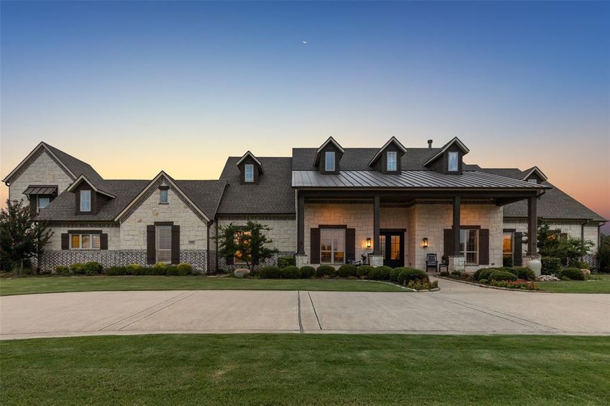 Introducing 3081 Brookhollow Court, a privately gated, custom-built estate set on a pristinely manicured acre in the elite enclave of Whispering Farms. This architectural showpiece offers nearly 6,700 sq ft of thoughtfully curated, single-level living—blending timeless sophistication with modern indulgence. Beyond the grand double-door entry, discover soaring ceilings, luminous interiors, and exquisite craftsmanship throughout. Five expansive en suite bedrooms, including dual primary suites, deliver elevated comfort and privacy. Our four legged friends wont be disappointed as they can choose one of two dog baths for their luxury spa experiance. A chef’s dream kitchen awaits with Sub-Zero, Wolf, and Bosch appliances, Italian-imported sinks, two dishwashers, and dual laundry rooms—designed for both everyday ease and elegant entertaining. The estate’s bespoke game and media wing stuns with a wet bar, wine cellar, dual ice makers, and signature Texas-shaped sink—with all furnishings conveying for a seamless, turnkey experience. Step outside into a 2022-built private resort featuring a custom pool, pergola-covered patios, and professionally designed landscaping, all framed by a 40-zone irrigation system and electric-gated perimeter. For the discerning collector, the oversized 4-car garage accommodates up to 6 vehicles and offers a climate-controlled storage suite, electric-lift walk-in attic, and abundant space for recreational luxury. Signature upgrades include: Whole-home water filtration, Custom new front windows, Advanced security system with break sensors ,Sonos audio throughout interior and exterior Zoned to Walnut Grove High School, this residence offers the ultimate blend of elegance, privacy, and sophistication in one of North Texas’s most prestigious communities.3081 Brookhollow Court is more than a home—it’s a statement. A rare opportunity to own a true legacy estate.