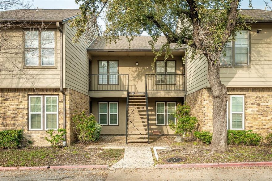 Charming first-floor 1-bedroom, 1.5-bath condo in a gated Far North Dallas community, featuring a primary bedroom with two walk-in closets, a covered private patio that backs to a grassy area, a stylish see-through fireplace, a dining room, and versatile living space or office. The kitchen boasts granite countertops, ample cabinets, plenty of workspace, and includes the refrigerator, flowing seamlessly into the living areas. A separate laundry room provides additional storage, and a stackable washer & dryer is included, making this property move-in ready. Engineered wood flooring runs throughout, complemented by fresh paint for a clean, modern look. Located in a well-established North Dallas neighborhood, the property blends comfortable suburban living with quick access to shopping, dining, and major roadways, including the Dallas North Tollway, George Bush Turnpike, and I-635. Residents enjoy community amenities such as a pool and tennis courts, with nearby parks and a dog park for added convenience. Golf enthusiasts will appreciate being just minutes from Bent Tree Country Club, a prestigious private golf destination. HVAC was updated in 2023, with an updated electrical panel