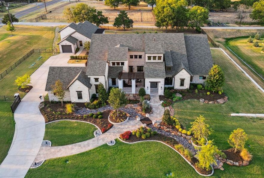 Experience luxury living at its finest with this nationally recognized, award-winning custom home by J. Anthony Custom Homes. Situated in the prestigious Barry Farms subdivision on over 2 acres of lush land, this 5-bedroom, 8-bathroom masterpiece boasts unparalleled features. Enjoy movie nights in the state-of-the-art media room, complete with a convenient snack bar. The spacious game room ensures endless fun, while the basement offers a bar area and a home gym for fitness enthusiasts. Relax in the spa-like primary suite bathroom or transition to outdoor living through the living room's automatic sliding glass door, revealing stunning pool views. Steps away, the Casita offers luxurious accommodations with 2 bedrooms, 2 bathrooms, a luxe living room, a full kitchen, and laundry. With too many features to list, this property truly has all the bells & whistles. Schedule a showing today to experience unparalleled luxury!