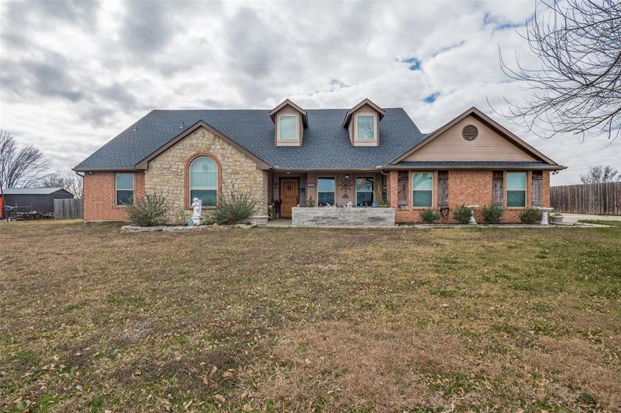 Welcome to 140 Hollis in Waxahachie, Texas, a rare opportunity to own a fully renovated home on land, outside the city limits, with no HOA and a low tax rate.  Set on 2.11 acres, this 2800 +-sq ft home has been thoughtfully renovated and offers 3 bedrooms, 2 bathrooms, media room, game room, multiple indoor and outdoor living spaces designed for both everyday comfort and entertaining. This property delivers a true luxury rural feel while still offering the convenience of suburban living. Inside, you will find a spacious living area filled with natural light, a beautifully updated kitchen with custom cabinets and granite countertops, an elegant dining space, and a private primary suite that feels like a retreat. The oversized custom closet and updated bathrooms complete the home with modern finishes while maintaining a warm, inviting feel throughout. Step outside and experience a lifestyle that is nearly impossible to find in today’s market. The backyard features a inground pool, expansive entertaining area. The land is fully usable and offers room to spread out, relax, and enjoy the good life. In addition to the main home, the property includes an 40X60 insulated workshop with electricity, water and a full bathroom. Making this property ideal for working from home, fitness, hobbies, or small business needs. All of this is just 5 minutes from downtown Waxahachie, where you can enjoy amazing dining, shopping, and entertainment, and within easy driving distance to Dallas.    Attn: Original sqft is what's shown on public information, 800+- sqft was added on in 2021 making the total living sqft 2876 +-
