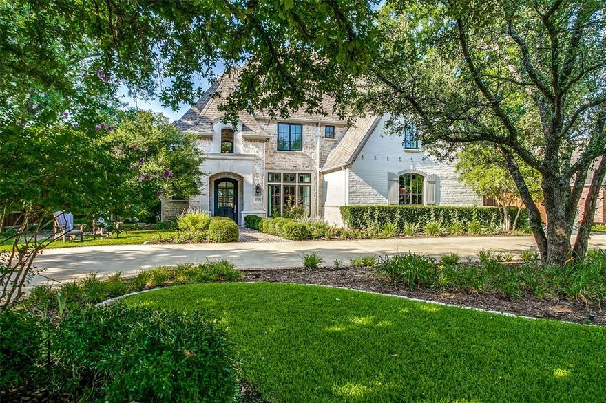 Extensively remodeled in 2020-2021 by John Young, this home has it all! Refinished hardwoods throughout, high ceilings, Pella windows and doors throughout. Completely new kitchen with beautiful cabinetry and top-of-the-line appliances including Subzero refrigeration, a Wolf induction cooktop, additional refrigeration drawers, large center island and wet bar. Lounge with bar and private patio, living room with fireplace and French doors that makes a great study, Primary suite downstairs with stunning bathroom, five additional bedrooms on the second level and large game room. Four wine and beverage stations located in the primary bedroom, lounge and upstairs, two utility rooms. Pool, spa, Mohave turf, outdoor grill. Three car garage plus circular driveway.