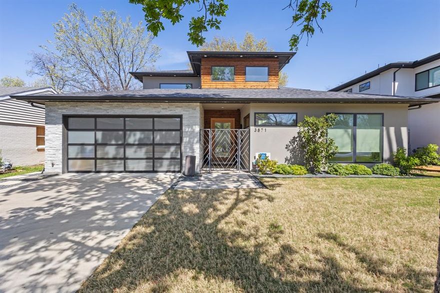 Stunning contemporary by The Avant Group showcasing exceptional craftsmanship and modern design. Striking curb appeal with glass garage doors and a private courtyard entry leads into a dramatic two-story foyer filled with natural light. This 4 bed, 4 bath home offers an open-concept layout connecting the living, dining, and chef’s kitchen featuring custom cabinetry, designer lighting, commercial-grade appliances, walk-in pantry with built-ins, and a coffee bar-dry bar with wine fridge. Light oak flooring flows throughout. The first-floor owner’s suite is a true retreat with vaulted ceilings and a spa-like bath including a dual sink floating vanity, soaking tub, oversized walk-in shower with dual heads, and a large custom California Closet. A secondary bedroom and full bath on the main level offer flexibility for guests or a home office. Upstairs includes two additional bedrooms with private baths and an oversized game room with balcony overlooking the backyard. Extensive upgrades throughout total over $165K, including a Control4 smart home system, automatic blinds and custom curtains, whole-home and outdoor speaker system, and outdoor AV hookups. The backyard is a low-maintenance oasis with professional turf and $40K in landscaping—perfect for entertaining.