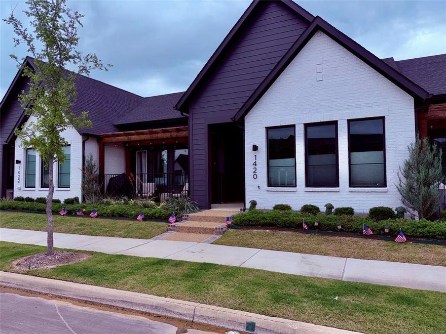 If you are looking for a One Story townhome with custom designs, then this should be your next home.  The open concept  has 10 ft ceilings,  wood like porcelain tile, quartz countertops throughout and a waterfall edge kitchen island.  The master bathroom is right out of a customer designers magazine with real marble backsplash from countertop to ceiling height.  Owner is an agent.