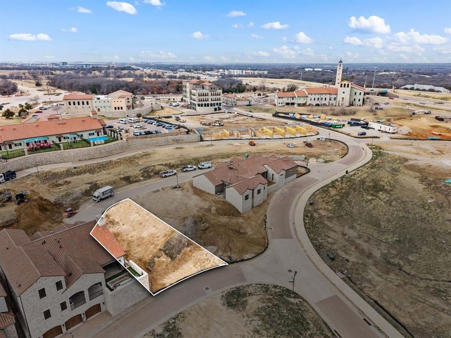 Discover an extraordinary opportunity to build within Entrada at Westlake, one of North Texas’s most distinctive and highly anticipated master-planned communities. Ideally positioned on approximately 85 acres at the southeast corner of SH-114 and Davis Boulevard in prestigious Westlake, Entrada is a vibrant European-inspired village modeled after the timeless charm of Catalonia, Spain.
This exceptional homesite offers the rare chance to design and build a custom residence surrounded by architectural beauty, cobblestone streets, and a thoughtfully curated walkable environment. Every detail of Entrada has been carefully envisioned blending old-world character with modern luxury to create a setting unlike anything else in North Texas.
Residents enjoy an elevated lifestyle defined by scenic canals, charming plazas, boutique retail, chef-driven dining, and beautifully designed gathering spaces all just steps from home. With convenient access to SH-114, you are minutes from DFW Airport, premier business corridors, and the region’s top destinations, while still enjoying the privacy and prestige that make Westlake one of the most sought-after addresses in Texas.
Whether you envision a lock-and-leave villa or a statement custom estate, this homesite places you at the heart of a one-of-a-kind community where timeless European elegance meets modern Texas luxury.