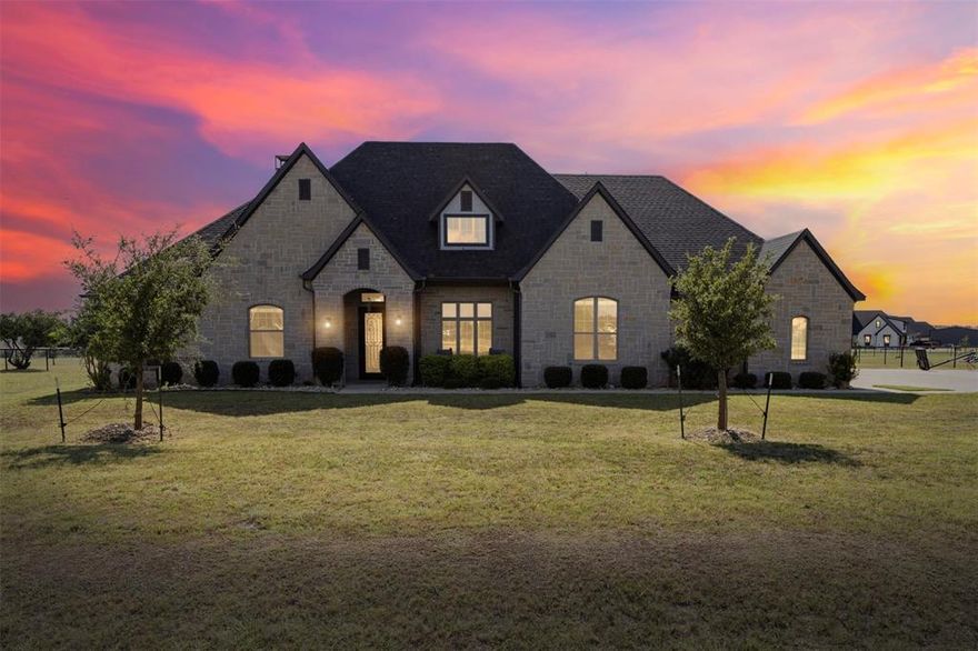 Built in 2020, this stunning 4-bedroom, 3.5-bath home with a 3-car garage offers modern comfort and Texas charm in the sought-after Starlight Ranch community of Godley. Set on over an acre, you’ll enjoy open spaces and rolling pastures just a short drive from Fort Worth via Chisholm Trail Parkway or Hwy 377. Inside, designer finishes and an open floor plan make everyday living and entertaining effortless. Step outside to a spacious patio with an outdoor kitchen and fireplace—perfect for gatherings or relaxing in your private retreat.