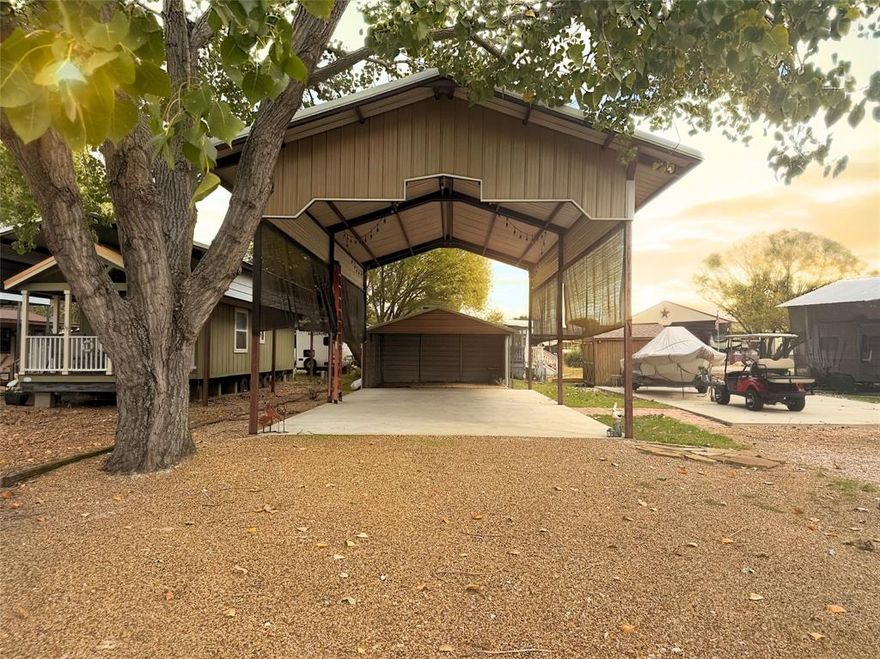 Dreaming of lake views, peaceful mornings, and endless weekends on the water? This lot delivers it all and then some. Perfectly positioned just across the street from the shimmering shoreline of Richland Chambers Lake, this property offers the best of both worlds: incredible water views and easy access to the nearby community boat ramp so you can be out on the water in minutes. Already equipped with covered parking, this property is ready for your RV, weekend lake setup, or future lake home. Imagine pulling in for the weekend, stepping outside to the sound of waves lapping the shore, and watching the sunset dance across the water from your front porch... Stop dreaming because this CAN be yours! With over half an acre to work with, there’s room to dream big..add an outdoor kitchen and fire-pit, or simply enjoy it as a peaceful getaway spot. Whether you’re looking for an investment, a vacation destination, or a future forever home, this lot offers the lifestyle and flexibility you’ve been searching for. Don’t settle for ordinary — this lot stands out from the rest. Start living the lake life today!