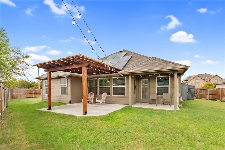 Price Adjustment on Large Corner Lot! Welcome to 1200 Queens Brook Lane, a 2021-built home offering 3 bedrooms, 2 baths, and 1,730 sq. ft. of modern living. This open floorplan features luxury vinyl plank flooring, abundant natural light, and an open-concept kitchen with stainless steel appliances, a large island with seating, a walk-in pantry and laundry room. The split primary suite is privately located away from secondary bedrooms and includes vaulted ceilings, dual sinks, a soaking tub, and a spacious walk-in closet. Smart home features include app-controlled lighting, security, and a programmable thermostat. Enjoy outdoor living with a beautiful, recently-added covered patio and oversized backyard. Enjoy lower electric bills and long term savings with energy-efficient solar panels. Situated on a desirable corner lot with great curb appeal and convenient access to shopping, dining, and major commuter routes. Move in ready and priced to sell! Schedule a tour today!