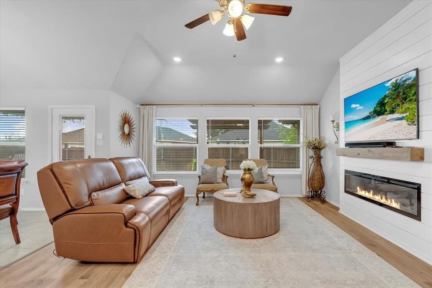 Price Adjustment on Large Corner Lot! Welcome to 1200 Queens Brook Lane, a 2021-built home offering 3 bedrooms, 2 baths, and 1,730 sq. ft. of modern living. This open floorplan features luxury vinyl plank flooring, abundant natural light, and an open-concept kitchen with stainless steel appliances, a large island with seating, a walk-in pantry and laundry room. The split primary suite is privately located away from secondary bedrooms and includes vaulted ceilings, dual sinks, a soaking tub, and a spacious walk-in closet. Smart home features include app-controlled lighting, security, and a programmable thermostat. Enjoy outdoor living with a beautiful, recently-added covered patio and oversized backyard. Enjoy lower electric bills and long term savings with energy-efficient solar panels. Situated on a desirable corner lot with great curb appeal and convenient access to shopping, dining, and major commuter routes. Move in ready and priced to sell! Schedule a tour today!