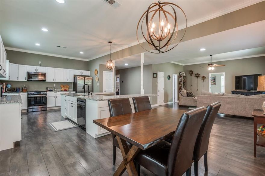 FABULOUS NEW PRICE!! Discover the perfect blend of vintage charm and modern living With a Great NEW PRICE in this beautifully updated 3-bedroom, 2-bath home, located on a .782 acre lot within a charming neighborhood that is convenient to US-287 and I-35.
This property offers small-town appeal with big city convenience being close to everything. Inside, you'll love the open-concept layout, where the living, dining, and kitchen areas flow effortlessly for easy entertaining. A custom built-in dining island doubles as a cozy breakfast spot or work-from-home station. The oversized primary suite is tucked away for added privacy, while two spacious secondary bedrooms share a well-appointed hall bath—ideal for guests or family.  At the back of the home, a large mudroom and laundry area offers additional storage and functionality. The expansive backyard is ready for your imagination!
Think -  garden, play area, future pool, workshop, chickens, livestock, the possibilities are endless! Almost 1 Acre of yard and a 1910 Historic Home that is just over 1 mile from Downtown Waxahachie!Schedule your private showing today!  Additional features include a new electric gate to the back of the property, 1-car garage with an electric door and remote, covered parking for a second vehicle, additional gravel parking pad.
You can have chickens and livestock within the city limits of Waxahachie, but there are restrictions.Homes with this much charm and land so close to downtown Waxahachie are rare—don’t miss your chance to make it yours.